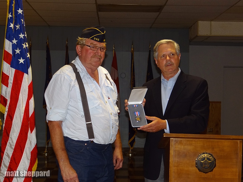 Tony Hofmann receives Silver Star for his uncle, from US Senator John Hoeven